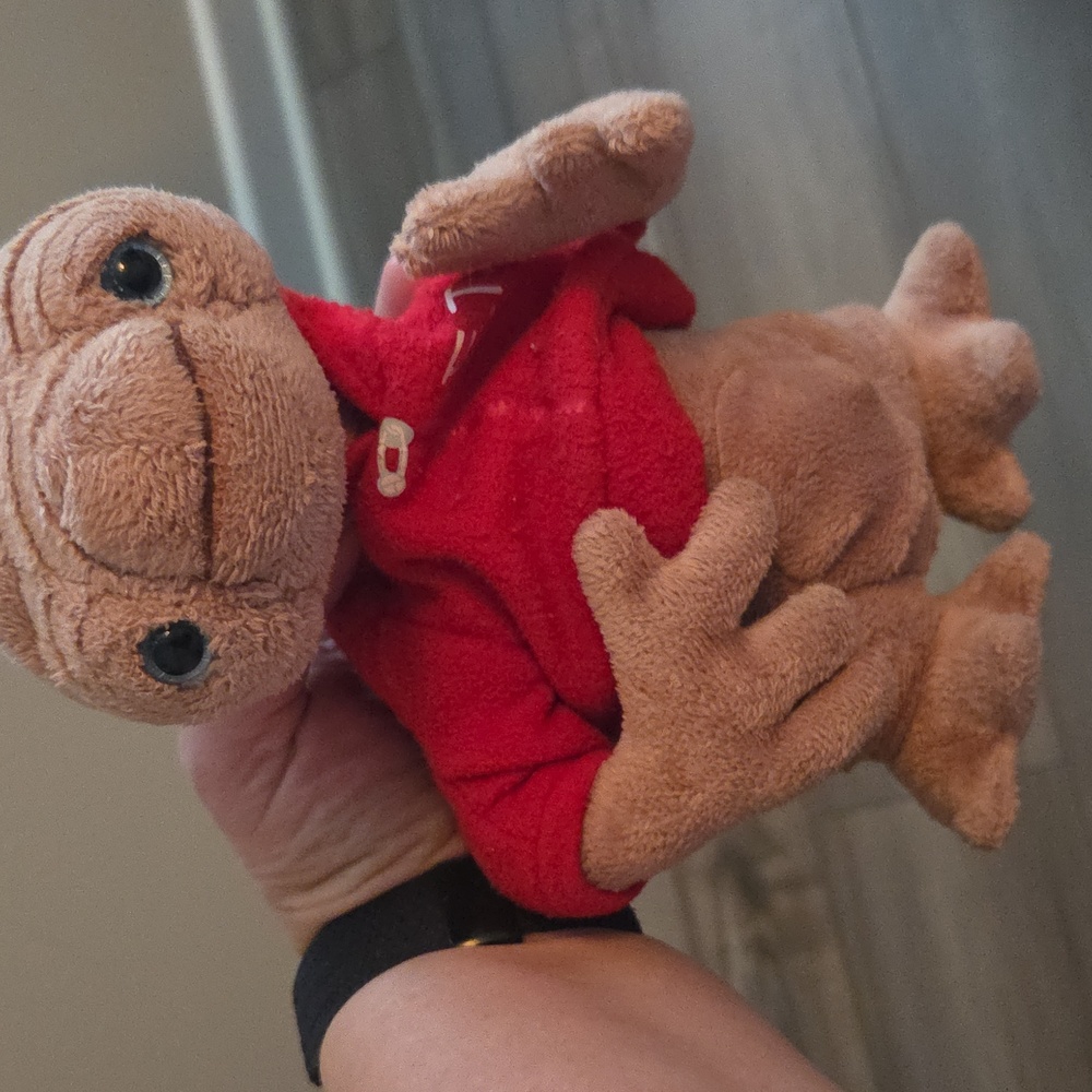 Universal Red and Tan Stuffed Animal